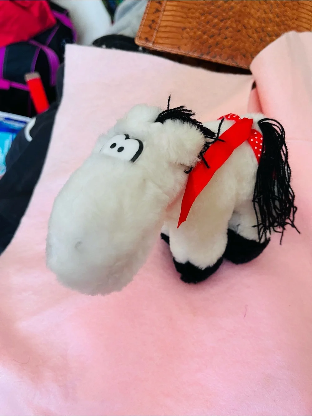 Plush White Horse with Red Ribbon
